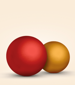 Deux boules colorées, rouge et or, sur fond clair.